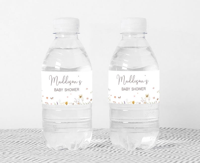 a bottle of water with a baby shower label on it