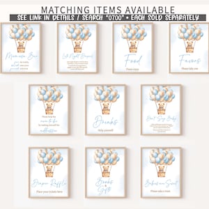 May include: Nine printable signs for a baby shower with a blue and beige color scheme. Each sign features a hot air balloon with a teddy bear and a different message. The messages include "Mimosas Bar", "Late Night Snacks", "Food", "Favors", "Please Help the Mom-to-Be", "Drinks", "Don't Say Baby", "Diaper Raffle", "Books & Gifts", and "Babies are Sweet".