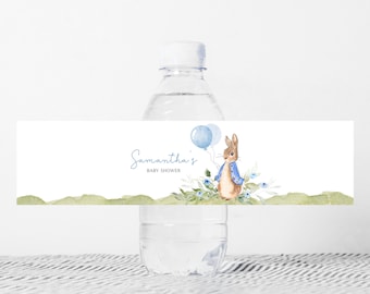 May include: Water bottle label featuring a watercolour illustration of a rabbit holding blue balloons. The label reads "Samantha's Baby Shower".