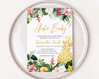 May include: Aloha Baby baby shower invitation with a tropical theme. The invitation features a gold pineapple, green leaves, and pink flowers. The text on the invitation reads "Aloha Baby" and includes the date, time, and location of the shower. The invitation also includes the name of the mom-to-be, Samantha Smith, and the RSVP information.