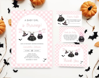 May include: Pink gingham baby shower invitations with a Halloween theme. The invitation reads "A Baby Girl is Brewing!" and includes a diaper raffle card, book request card, and thank you card. Decorative pumpkins and bats are scattered around.