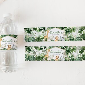 May include: Water bottle labels with a jungle theme. The labels feature a green, leafy background with a variety of animals, including a giraffe, elephant, lion, and zebra. The text on the labels reads "Samantha's Baby Shower".