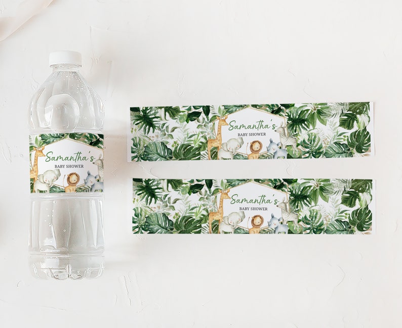 May include: Water bottle labels with a jungle theme. The labels feature a green, leafy background with a variety of animals, including a giraffe, elephant, lion, and zebra. The text on the labels reads "Samantha's Baby Shower".