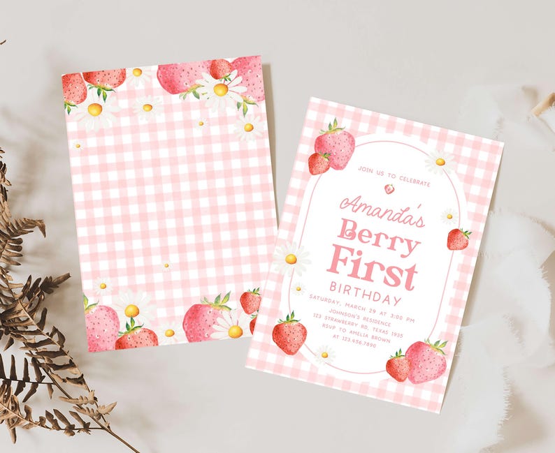 a pink and white checkered paper with strawberries on it
