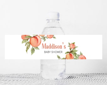 May include: Peach-themed baby shower water bottle label with the text "Maddison's Baby Shower" printed on a white background.