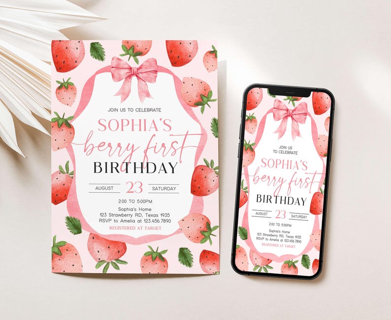 a pink and white strawberry themed birthday party
