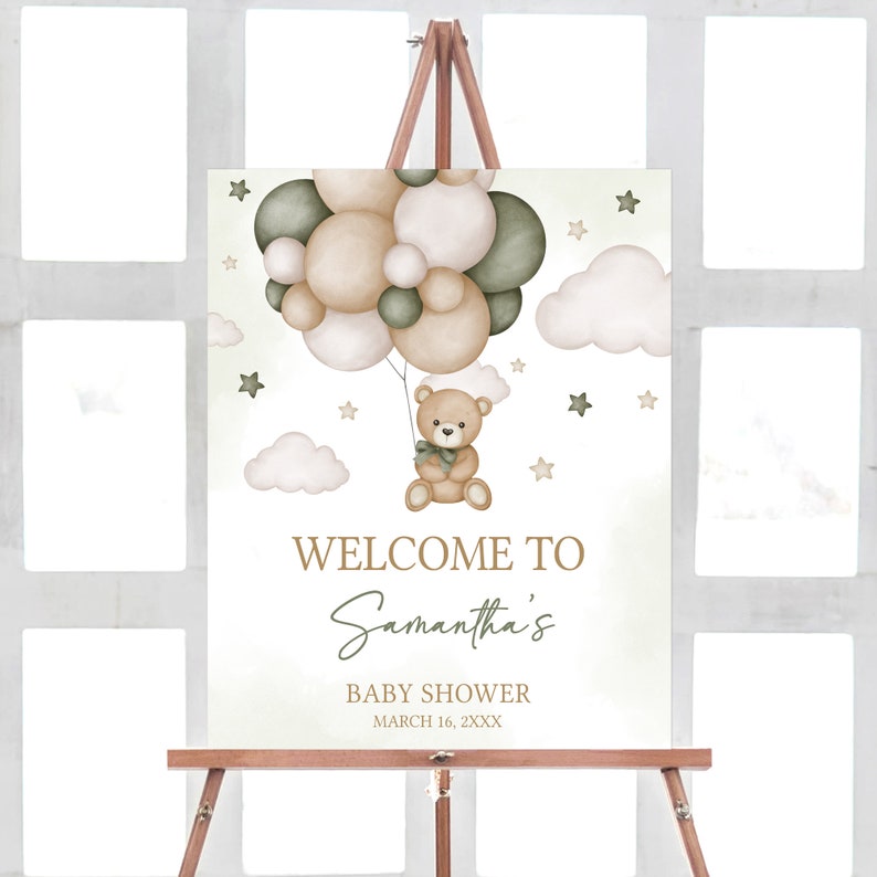 May include: Welcome to Samantha's Baby Shower sign with a teddy bear holding balloons in green and brown tones. The sign has a watercolor background with clouds and stars.
