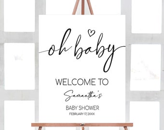 Op de afbeelding: Een wit bord op een houten ezel met de woorden "oh baby" in zwart script en een hartje. Er staat ook "WELCOME TO Samantha's BABY SHOWER FEBRUARY 17, 2XXX".