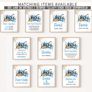 a set of nine blue and white posters