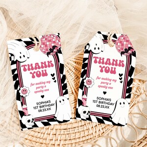 two thank you cards sitting on top of a wicker basket