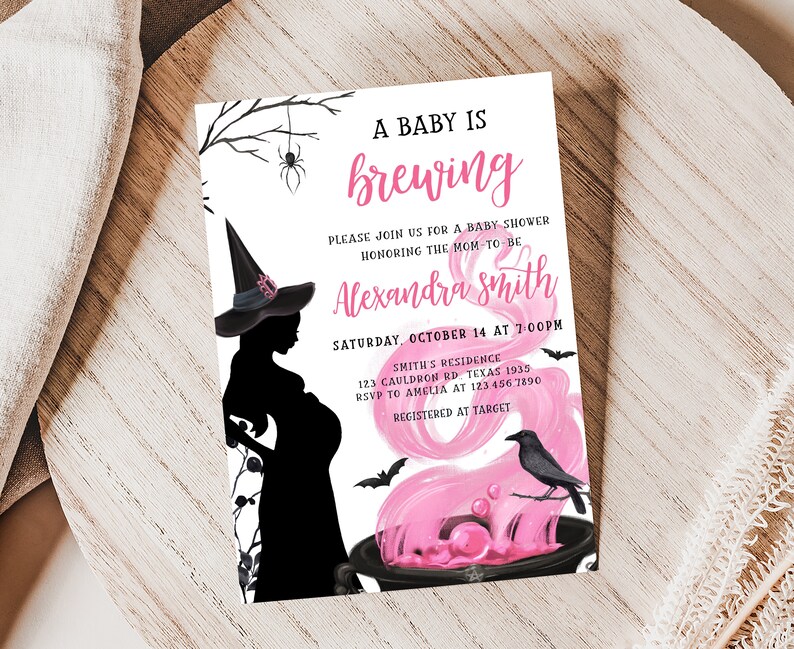 May include: A baby shower invitation with a witch theme. The invitation features a silhouette of a pregnant witch wearing a hat, with the text "A Baby is Brewing." The invitation includes the name "Alexandra Smith" and event details.