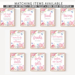 May include: A set of ten printable signs for a baby shower. The signs are decorated with pink and blue flowers and butterflies. The signs include titles such as "Late Night Diapers", "Mom-Osa Bar", "Food", "Favors", "Please Help the Mom-to-be Addressee", "Drinks", "Don't Say Baby", "Diaper Raffle", "Books & Gifts", and "Babies are Sweet".