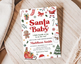 Peut inclure: Une invitation de baby shower sur le thème de Noël. L'invitation présente les mots "Santa Baby" en rouge, ainsi que des illustrations du Père Noël, d'un bonhomme de neige et d'autres éléments de vacances. L'invitation comprend les détails de la baby shower.