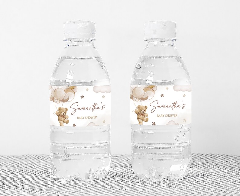 a bottle of water with a teddy bear label on it