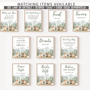 May include: Set of ten printable signs for a woodland themed baby shower. The signs feature a watercolor background with mountains, trees, and foxes. The signs include titles such as "Momosa Bar", "Late Night Diapers", "Food", "Favors", "Drinks", "Don't Say Baby", "Diaper Raffle", "Books & Gifts", and "Babies are Sweet".