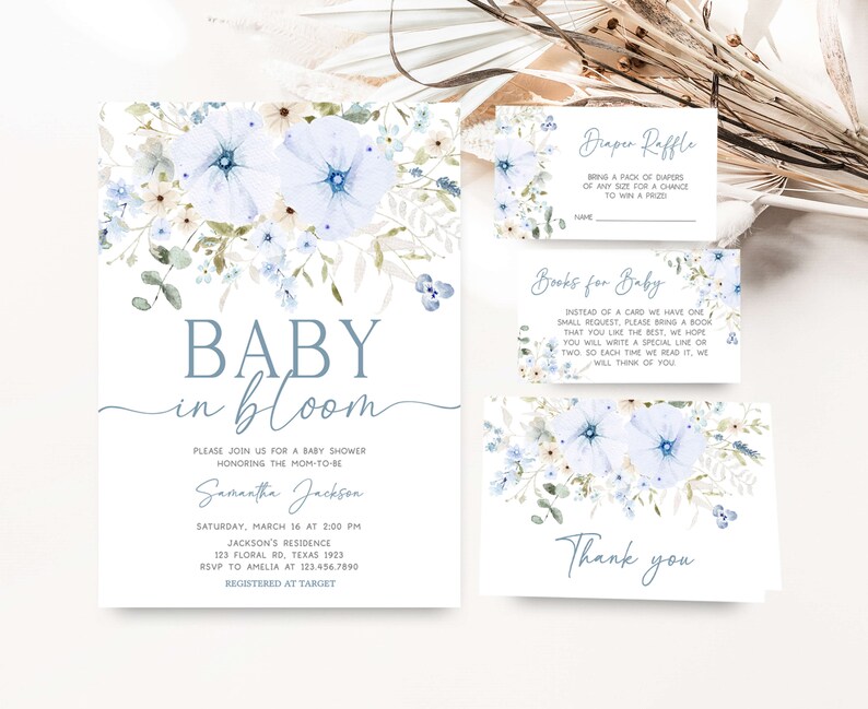 a blue and white floral baby in bloom suite