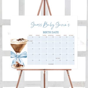 a blue and white calendar with a drink on it