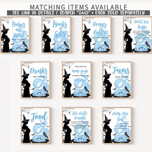 Puede incluir: Una colecci&oacute;n de letreros enmarcados con tem&aacute;tica de Halloween, con una silueta de bruja embarazada, un cuervo y dise&ntilde;os et&eacute;reos azules. Cada letrero tiene texto como "Babies are Sweet" y "Diaper Raffle".