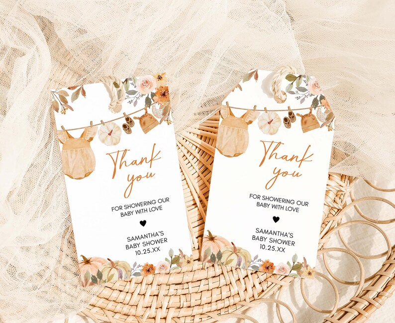 two thank you cards sitting on top of a wicker basket