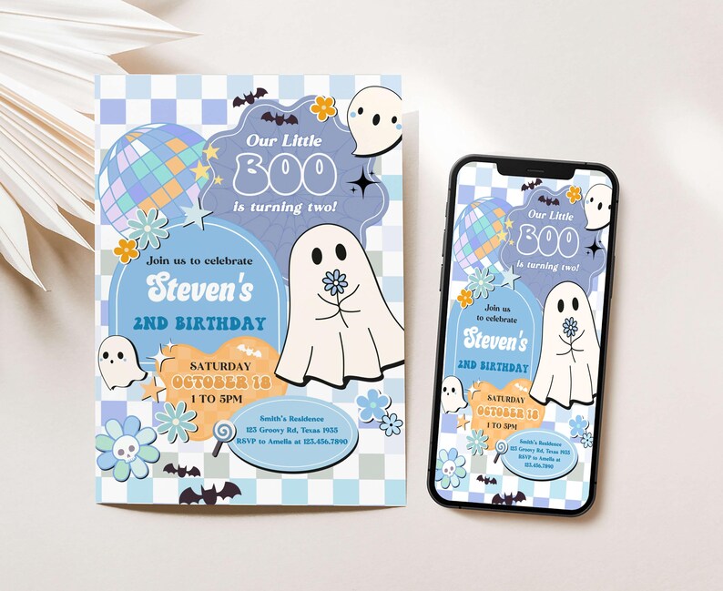 a phone and a birthday card on a table
