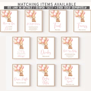 May include: Ten printable signs for a baby shower with a pink and beige color scheme. Each sign features a teddy bear holding pink and beige balloons and text in pink. The signs include: "Mommy-to-be", "Late Night Dompers", "Food", "Favors", "Please help the mommy-to-be by making out the address", "Drinks", "Don't Say Baby", "Diaper Raffle", "Books & Gifts", and "Babies are Sweet".