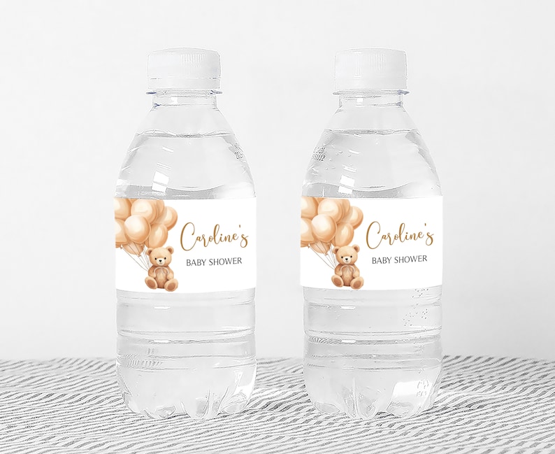 a bottle of water with a teddy bear on it
