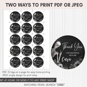a black and white photo of a round sticker with the words thank you for