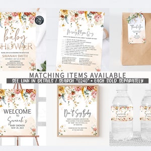 Pu&ograve; includere: Un set di decorazioni per baby shower stampabili a tema floreale. Il set include un cartello di benvenuto, un cartello "non dire baby", un invito a baby shower, un gioco di rime per l'allattamento, un'etichetta di ringraziamento e etichette per bottiglie d'acqua. Il design floreale presenta fiori rosa, arancioni e gialli con foglie verdi.