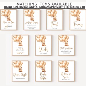May include: Nine printable signs for a baby shower with a teddy bear theme. Each sign features a teddy bear holding balloons and a different message. The signs include "Mama-go Bar", "Late Night Drinks", "Food", "Favors", "Please help the mom-to-be by making yourself at home", "Drinks", "Don't Say Baby", "Diaper Raffle", "Books & Gifts", and "Babies are Sweet".