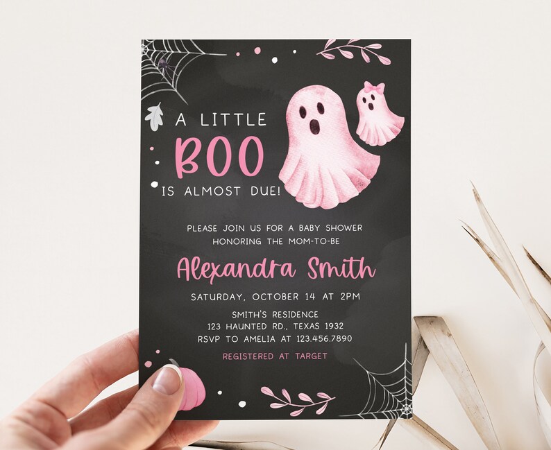 May include: A Halloween-themed baby shower invitation with a black chalkboard background. The invitation features pink watercolor ghosts and the text "A Little Boo is Almost Due!" The invitation is for Alexandra Smith's baby shower.