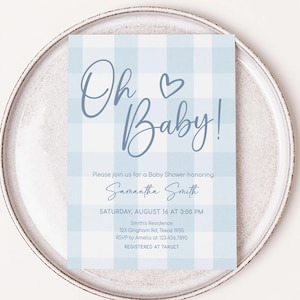 a plate with a card on it that says oh baby