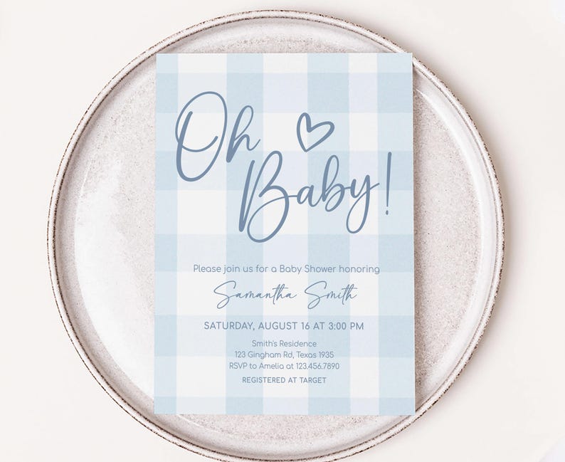 a plate with a card on it that says oh baby