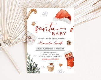 Peut inclure: Une invitation de baby shower sur le thème de Noël avec les mots "Santa Baby" en écriture rouge. L'invitation comprend des illustrations à l'aquarelle d'un bonnet de Père Noël, d'une chaussette et d'autres éléments festifs.