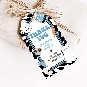 a thank you tag attached to a present box