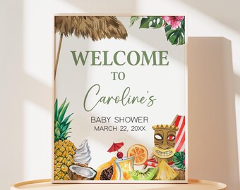 Könnte beinhalten: Willkommen zur Babyparty von Caroline Schild mit tropischem Thema. Das Schild zeigt ein grünes, braunes und weißes Strohdach, grüne Palmblätter, eine Ananas, eine Kokosnuss, eine Papaya, eine Kiwi, einen Cocktail und eine Tiki-Maske.