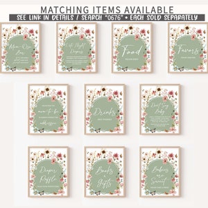 May include: Set of ten printable signs for a baby shower. The signs feature a floral design with butterflies and green and pink colors. The signs include titles such as "Mom-to-be", "Drinks", "Don't Say Baby", "Diaper Raffle", "Books & Gifts", and "Babies are Sweet".