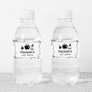 Two clear plastic water bottles with labels that say "Maddison's Baby Shower" in a black and white design.