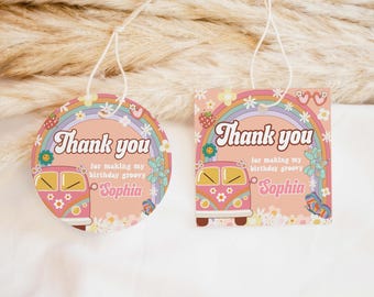 May include: Two pink and white thank you tags with a groovy van design and flowers. The text on the tags reads "Thank you for making my birthday groovy Sophia".