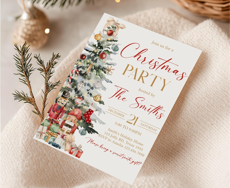 a christmas party card sitting on top of a blanket
