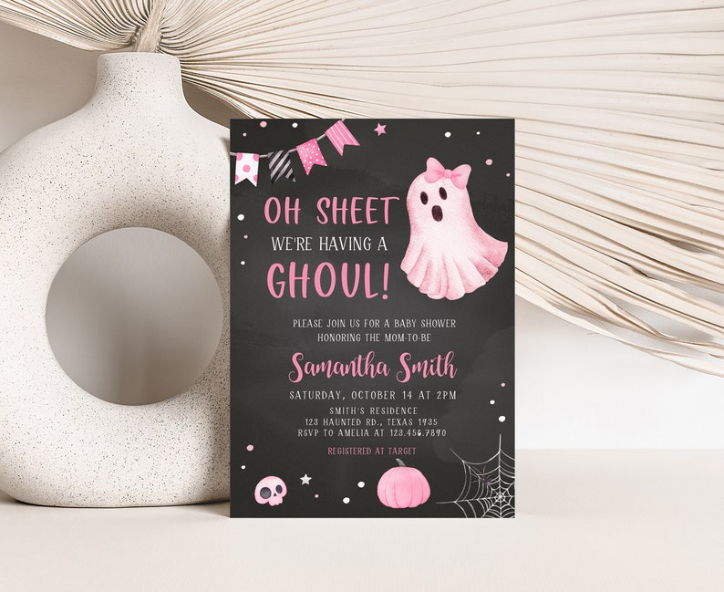 May include: A Halloween-themed baby shower invitation with a black chalkboard background. The invitation features pink text and a watercolor ghost illustration. The text reads "Oh Sheet We're Having a Ghoul!" and includes event details.
