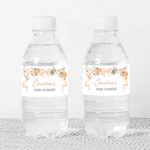 a bottle of water with a label for a baby shower