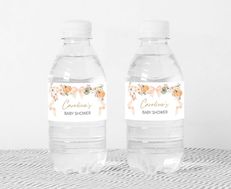 a bottle of water with a label for a baby shower