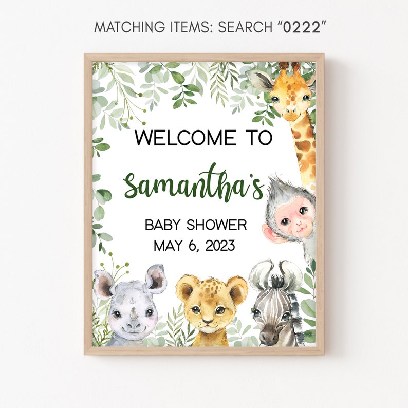 May include: A welcome sign for a baby shower with a jungle theme. The sign features a giraffe, monkey, rhino, lion, and zebra with green foliage. The text reads "Welcome to Samantha's Baby Shower May 6, 2023".