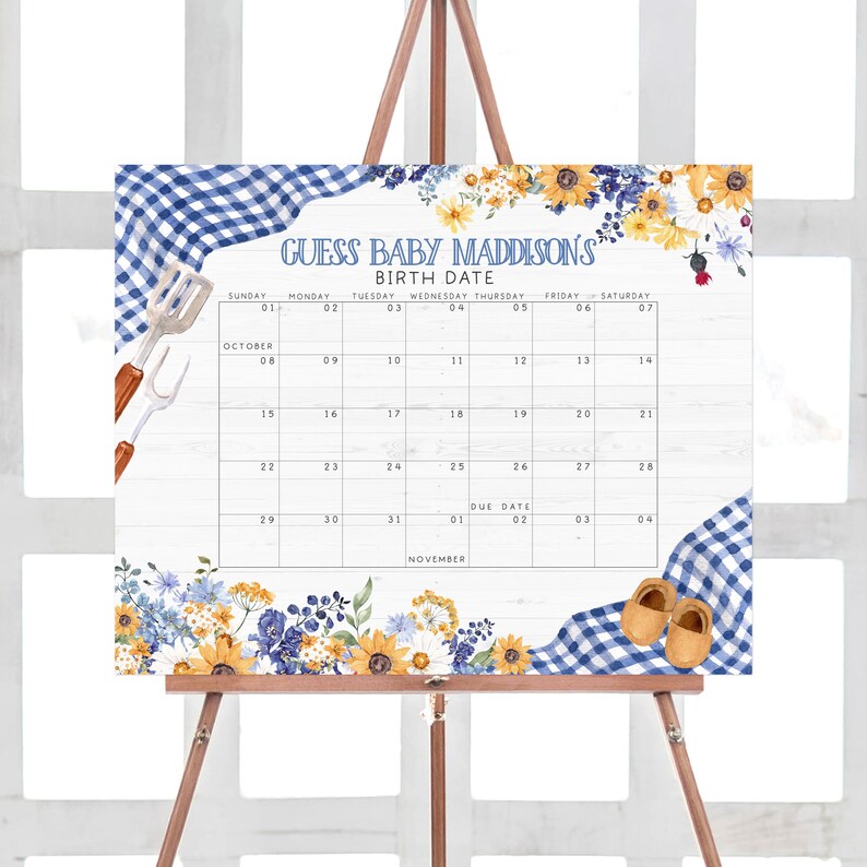 May include: A blue and white gingham baby shower game with a calendar for guests to guess the baby's birth date. The calendar is decorated with sunflowers and blue flowers. The text on the calendar reads "Guess Baby Maddison's Birth Date".