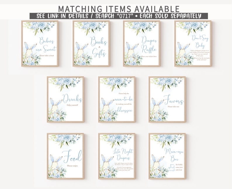 May include: Blue and white baby shower signs with a bunny rabbit illustration. The signs include text such as "Babies are Sweet", "Books & Gifts", "Diaper Raffle", "Don't Say Baby", "Drinks", "Mom-to-be Addressee", "Favors", "Food", "Late Night Diapers", and "Mimosas Bar".