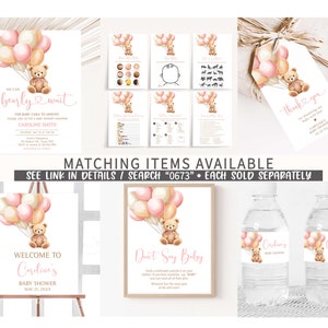 May include: A set of printable baby shower decorations featuring a teddy bear holding pink and beige balloons. The set includes a welcome sign, a don't say baby sign, water bottle labels, a thank you tag, and a game card. The text on the welcome sign reads "Welcome to Caroline's Baby Shower May 25, 20XX".