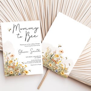 a close up of a paper with flowers on it