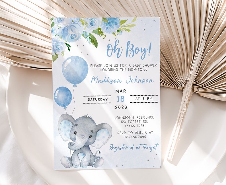 May include: A blue and white baby shower invitation with a watercolor illustration of a gray elephant holding blue balloons. The invitation reads "Oh Boy!" and includes the text "Maddison Johnson" and details for the shower.