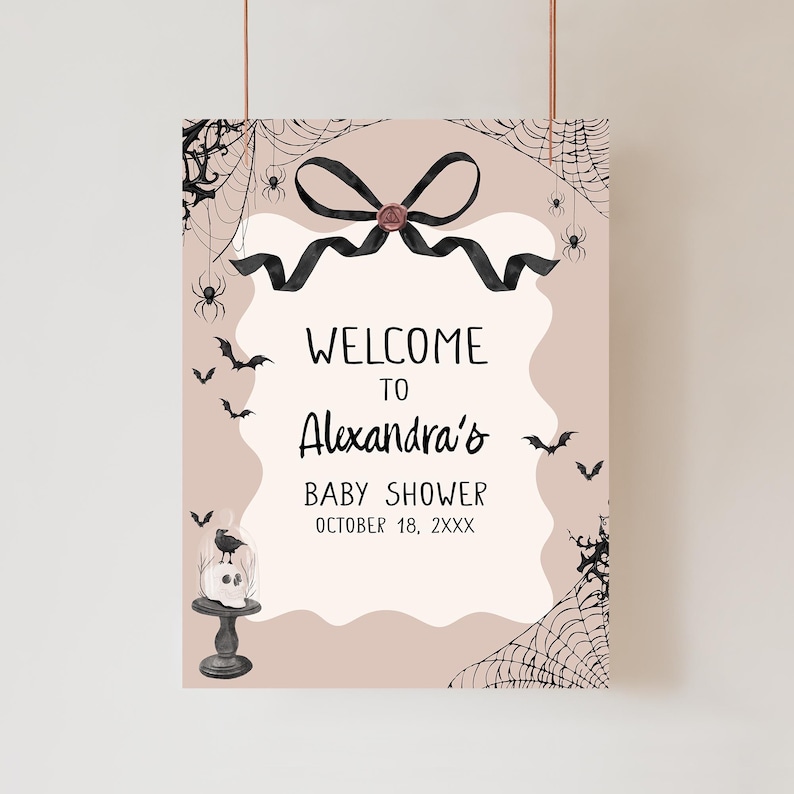 a welcome sign hanging from a hook on a wall