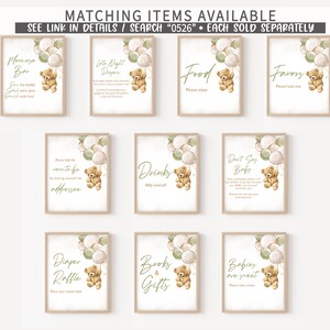 May include: Set of ten printable baby shower signs featuring a teddy bear holding balloons. The signs include titles such as "Morn-eza Bar", "Late Night Diapery", "Food", "Favory", "Please help the move-to-be adfressee", "Drinks", "Don't Say Baby", "Diaper Raffle", "Books & Gifts", and "Babies are sweet".